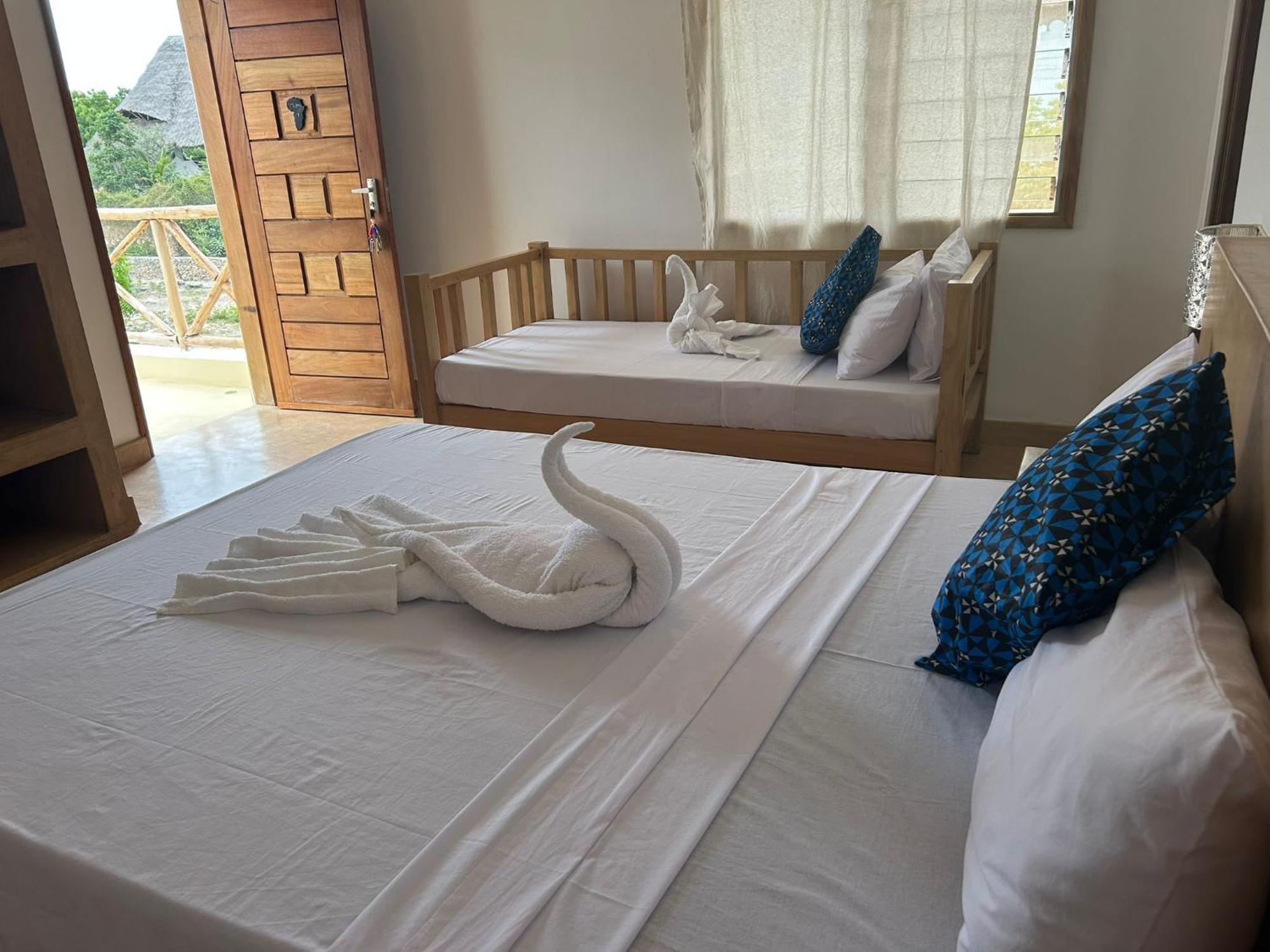 Tatu Inn Boutique Hotel ワタム エクステリア 写真